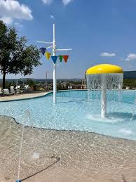 12505 Stapp Ct, Austin, TX 78732 - community pool with a water play area