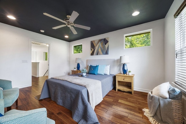 3407 Banton Rd Unit A, Austin, TX 78722 - bedroom with wood finished floors, recessed lighting, a ceiling fan, and baseboards