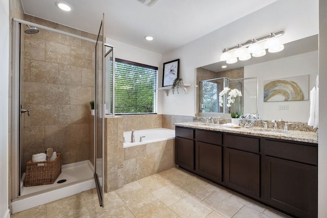 3407 Banton Rd Unit A, Austin, TX 78722 - full bathroom with a bath, a shower stall, double vanity, and tile patterned floors