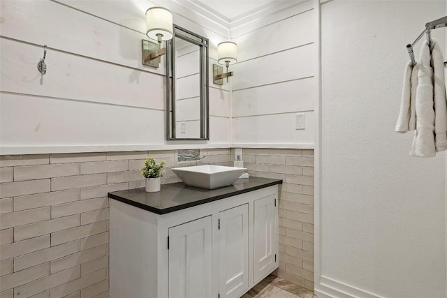119 Vicinity Trl, Spicewood, TX 78669 - bathroom with vanity and tile walls