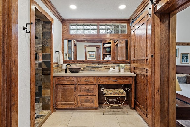 119 Vicinity Trl, Spicewood, TX 78669 - full bathroom featuring vanity, tile patterned floors, and recessed lighting