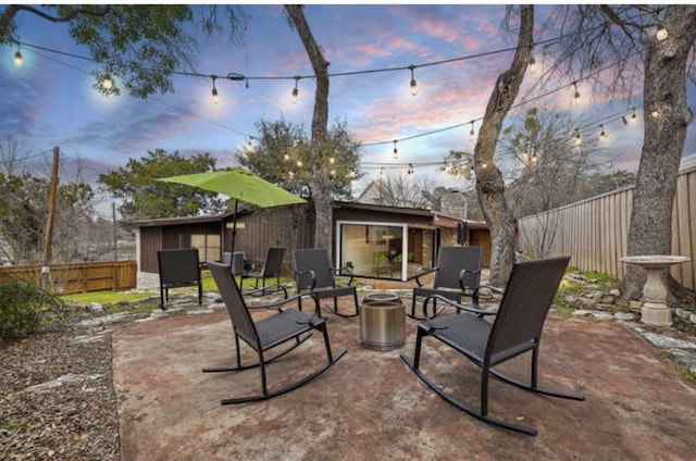 119 Vicinity Trl, Spicewood, TX 78669 - fenced backyard with a patio