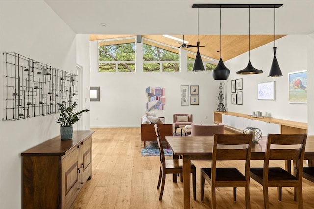 4005 Knollwood Dr, Austin, TX 78731 - dining room with high vaulted ceiling and light wood finished floors