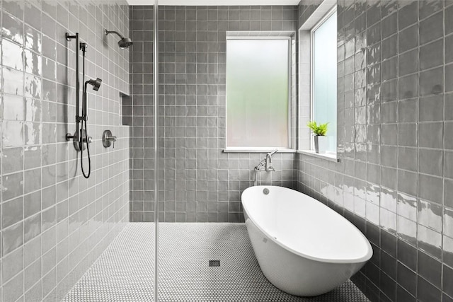4005 Knollwood Dr, Austin, TX 78731 - full bathroom with tiled shower, a freestanding tub, and tile walls