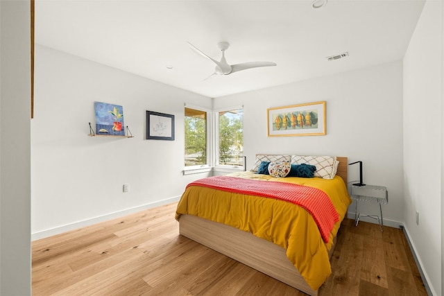 4005 Knollwood Dr, Austin, TX 78731 - bedroom featuring wood finished floors and a ceiling fan