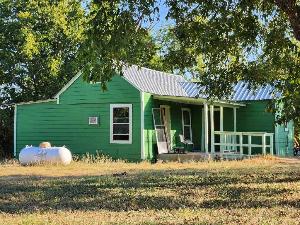 170 Easy St, Dale, TX 78616 - view of front of home with metal roof