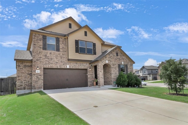 351 Jarbridge Dr, Kyle, TX 78640 - view of front facade with brick siding, a garage, and concrete driveway
