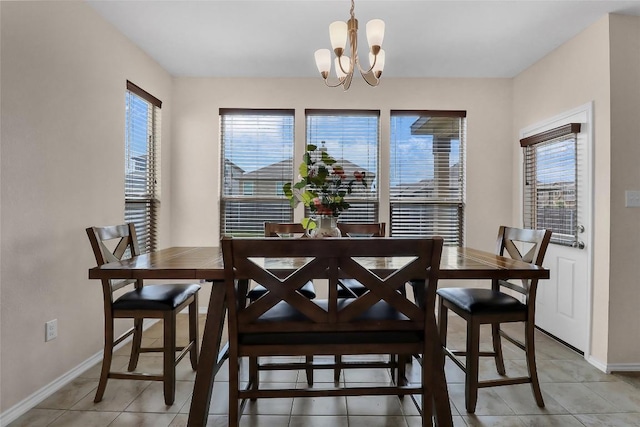 351 Jarbridge Dr, Kyle, TX 78640 - dining room featuring baseboards, a chandelier, and light tile patterned flooring
