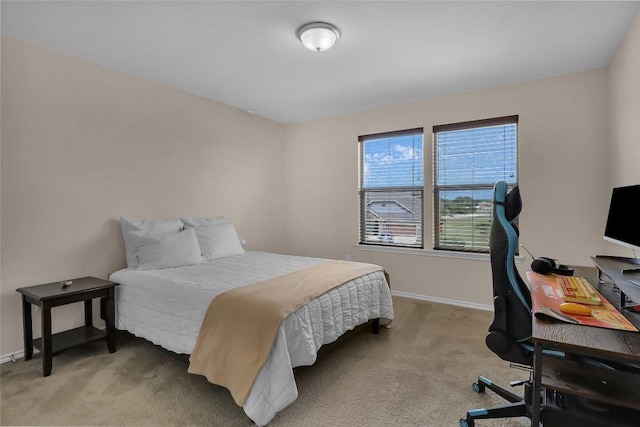 351 Jarbridge Dr, Kyle, TX 78640 - bedroom featuring light carpet, baseboards, and an office area
