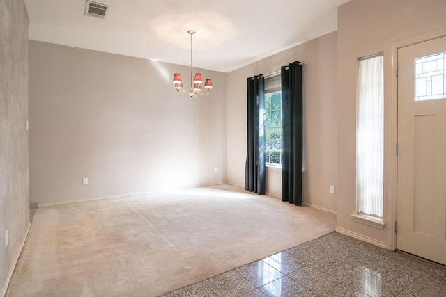 8006 Monona Ave, Austin, TX 78717 - entryway with granite tiled floors, healthy amount of natural light, a chandelier, and baseboards