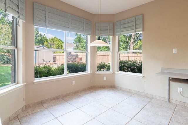 8006 Monona Ave, Austin, TX 78717 - unfurnished sunroom with healthy amount of natural light and baseboards