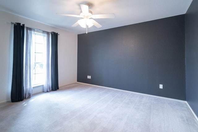 8006 Monona Ave, Austin, TX 78717 - empty room with ceiling fan, baseboards, and light carpet