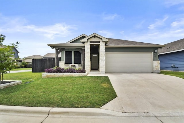 801 Russet Rock Dr Unit 6, Manchaca, TX 78748 - view of front of property featuring stone siding, a garage, a front yard, and driveway