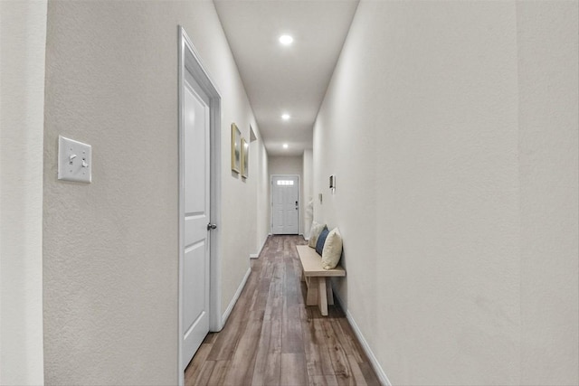 801 Russet Rock Dr Unit 6, Manchaca, TX 78748 - corridor featuring wood finished floors, recessed lighting, baseboards, and a textured wall