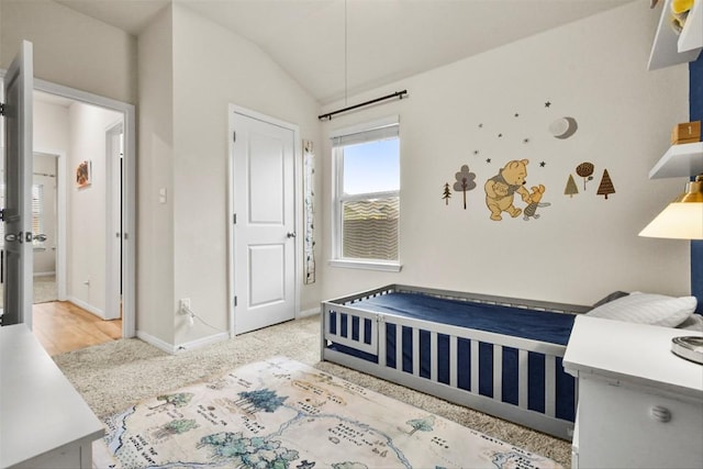 801 Russet Rock Dr Unit 6, Manchaca, TX 78748 - carpeted bedroom with vaulted ceiling and baseboards