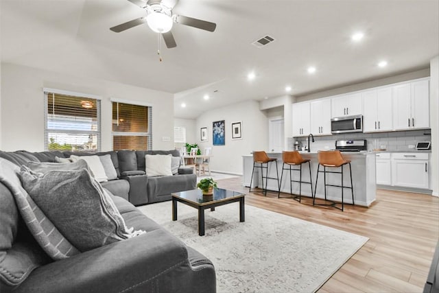 801 Russet Rock Dr Unit 6, Manchaca, TX 78748 - living area featuring recessed lighting, light wood finished floors, and ceiling fan