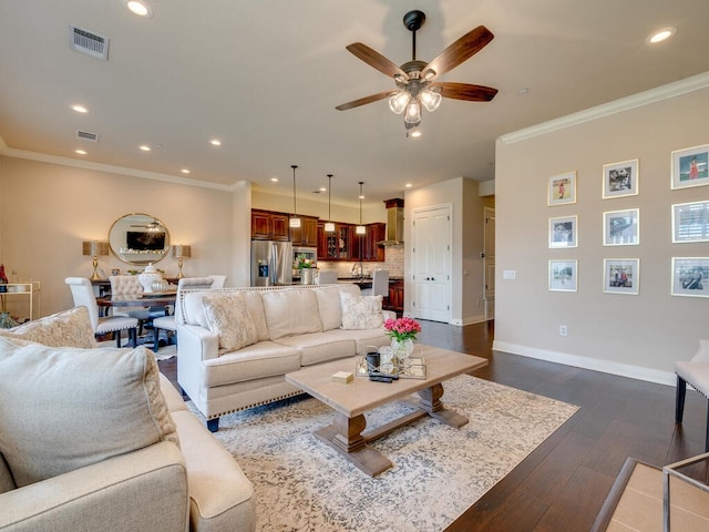 2601 N Quinlan Park Rd Unit 508, Austin, TX 78732 - living area featuring ornamental molding, ceiling fan, recessed lighting, baseboards, and dark wood-style flooring