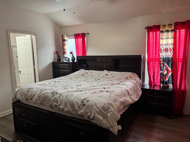 13409 Pine Needle St, Manor, TX 78653 - bedroom featuring dark wood-type flooring and vaulted ceiling