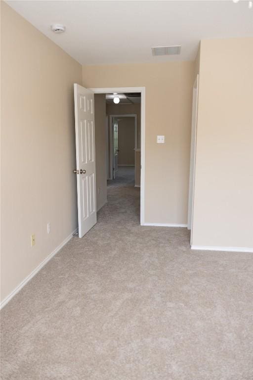 12 Verde Ranch Loop, Leander, TX 78641 - empty room featuring light carpet and a smoke detector