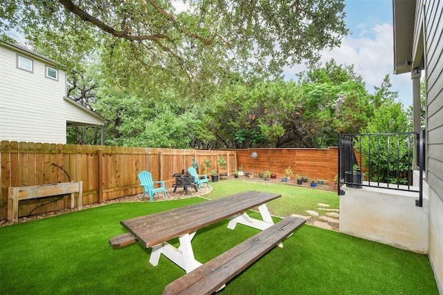 10401 Bramble Berry Dr, Austin, TX 78748 - fenced backyard featuring a fire pit
