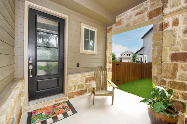 10401 Bramble Berry Dr, Austin, TX 78748 - view of exterior entry with a porch and stone siding