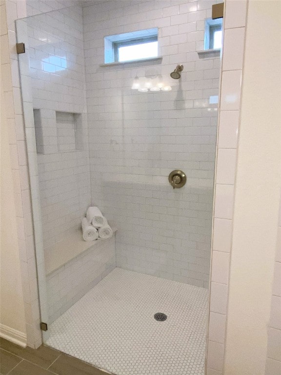 19024 Fernando Trl, Austin, TX 78738 - full bath featuring a shower stall and tile patterned floors
