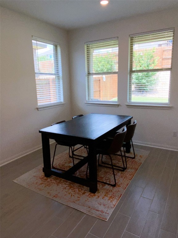 19024 Fernando Trl, Austin, TX 78738 - dining room featuring wood finished floors, baseboards, and recessed lighting