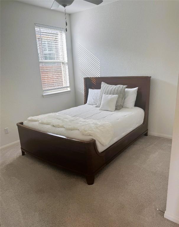 19024 Fernando Trl, Austin, TX 78738 - bedroom featuring carpet, baseboards, and a ceiling fan