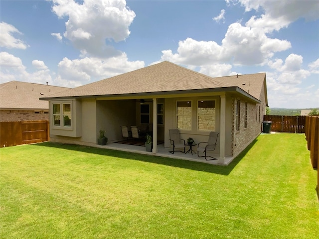 19024 Fernando Trl, Austin, TX 78738 - rear view of property featuring a patio area, a ceiling fan, and a shingled roof