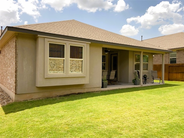 19024 Fernando Trl, Austin, TX 78738 - rear view of property with a patio, ceiling fan, roof with shingles, brick siding, and stucco siding