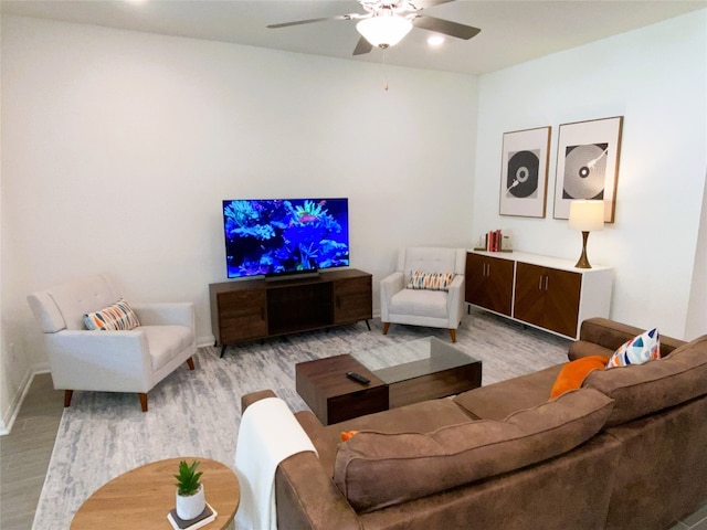 19024 Fernando Trl, Austin, TX 78738 - living area featuring light wood finished floors, a ceiling fan, and baseboards