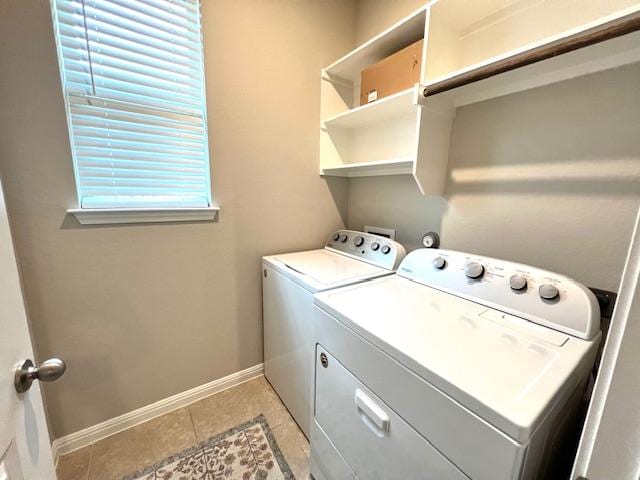 232 Serpens St, Georgetown, TX 78628 - washroom featuring washing machine and dryer and light tile patterned floors