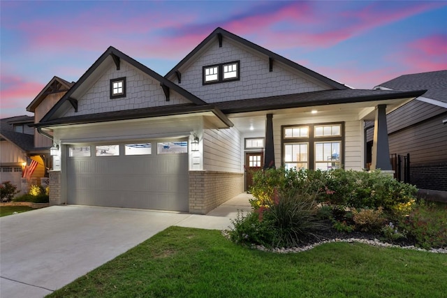 620 Saturnia Dr, Georgetown, TX 78628 - craftsman house featuring driveway, an attached garage, brick siding, a yard, and a porch