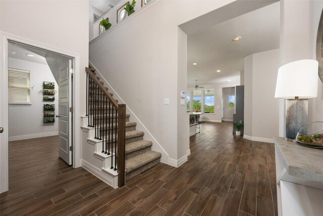 620 Saturnia Dr, Georgetown, TX 78628 - stairs featuring wood finished floors, recessed lighting, and ceiling fan
