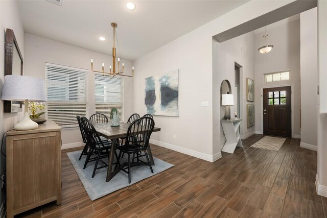 620 Saturnia Dr, Georgetown, TX 78628 - dining space featuring a chandelier, dark wood-type flooring, and recessed lighting