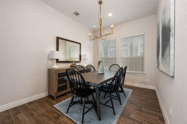 620 Saturnia Dr, Georgetown, TX 78628 - dining area with a chandelier, dark wood-style flooring, and recessed lighting