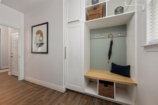620 Saturnia Dr, Georgetown, TX 78628 - mudroom with baseboards and dark wood-style flooring