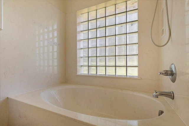 910 Garwood St, Smithville, TX 78957 - full bathroom with a tub to relax in