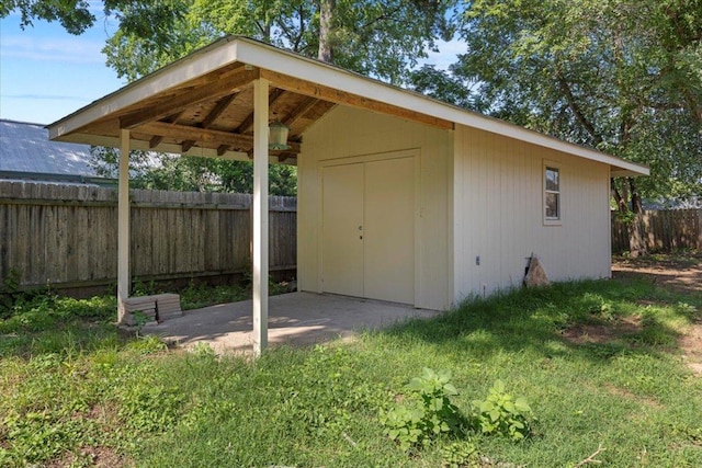 910 Garwood St, Smithville, TX 78957 - view of shed with a fenced backyard