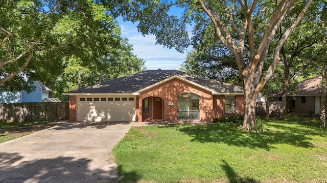 910 Garwood St, Smithville, TX 78957 - single story home featuring brick siding, a garage, and concrete driveway