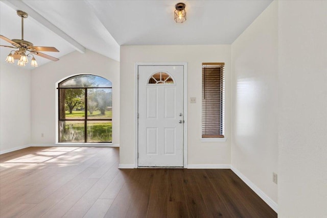 910 Garwood St, Smithville, TX 78957 - foyer featuring beam ceiling, dark wood-style floors, and ceiling fan
