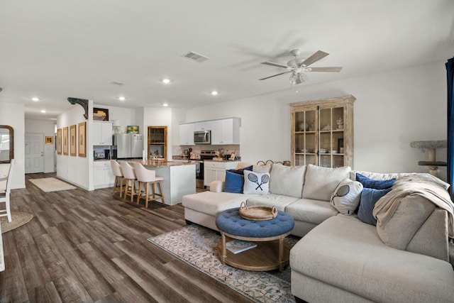 121 Rubrum Rd, Kyle, TX 78640 - living room featuring dark wood-type flooring, ceiling fan, and recessed lighting