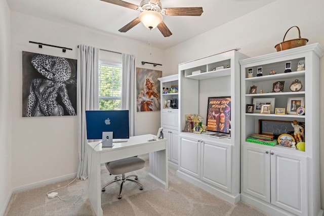 121 Rubrum Rd, Kyle, TX 78640 - home office with light carpet, ceiling fan, and baseboards