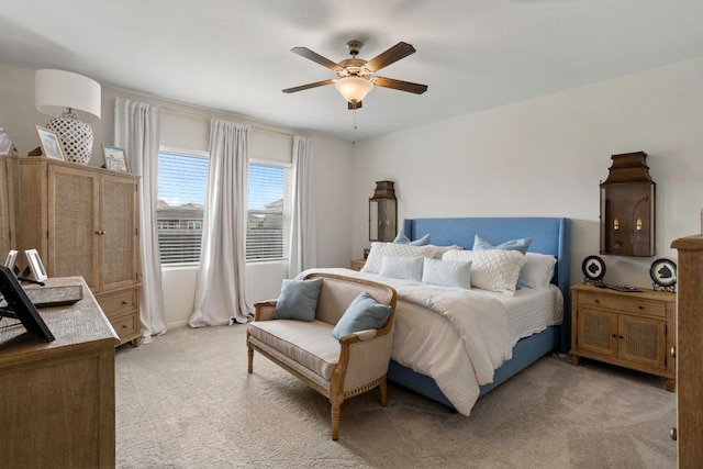 121 Rubrum Rd, Kyle, TX 78640 - bedroom with light colored carpet and a ceiling fan
