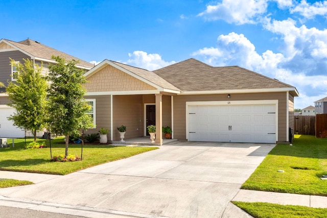 121 Rubrum Rd, Kyle, TX 78640 - view of front of house featuring an attached garage and concrete driveway
