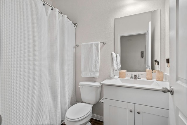 121 Rubrum Rd, Kyle, TX 78640 - bathroom with vanity, a shower with curtain, and a textured wall