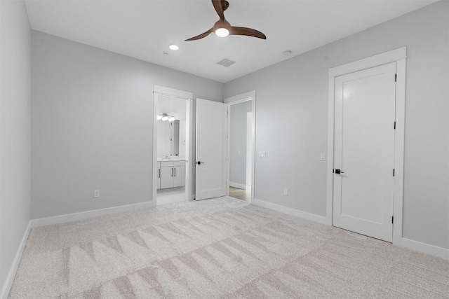 1707 Barn Swallow Dr, Austin, TX 78746 - unfurnished bedroom with light carpet, baseboards, connected bathroom, recessed lighting, and a ceiling fan