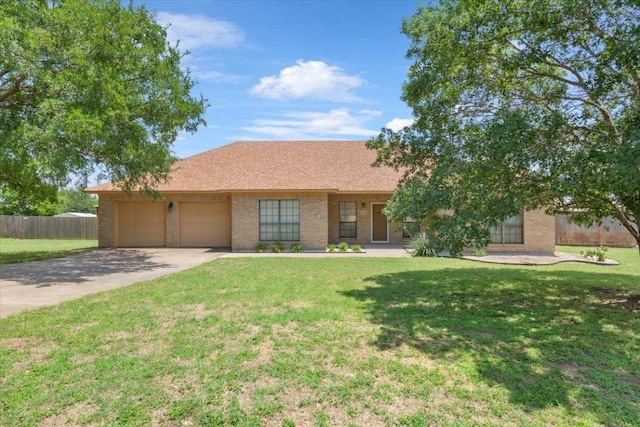 3609 Walter Ln, Belton, TX 76513 - ranch-style home featuring a garage, driveway, and brick siding