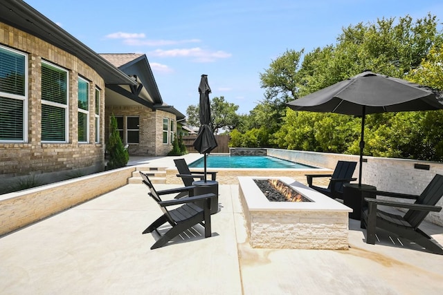 206 Bridge Water Loop, Dripping Springs, TX 78620 - swimming pool with an outdoor fire pit and a patio area