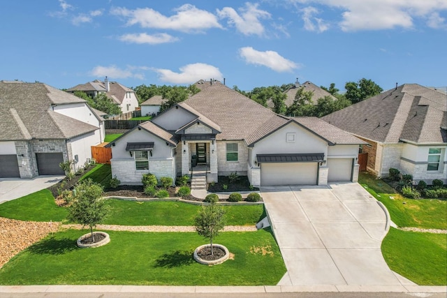 206 Bridge Water Loop, Dripping Springs, TX 78620 - french country inspired facade with stone siding, an attached garage, stucco siding, driveway, and a residential view